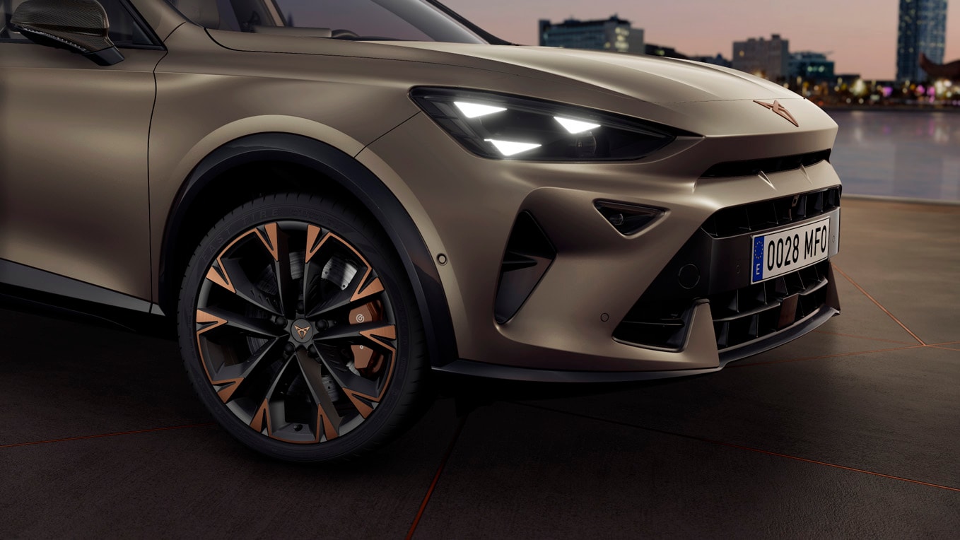 dark forest cupra born electric vehicle in motion