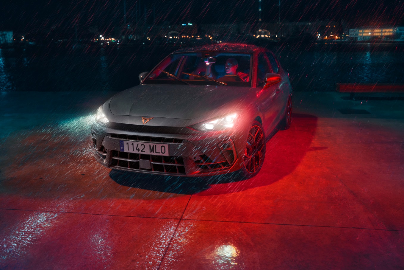 cupra formentor and man wating to received roadside assistance for electric and hybrid cars