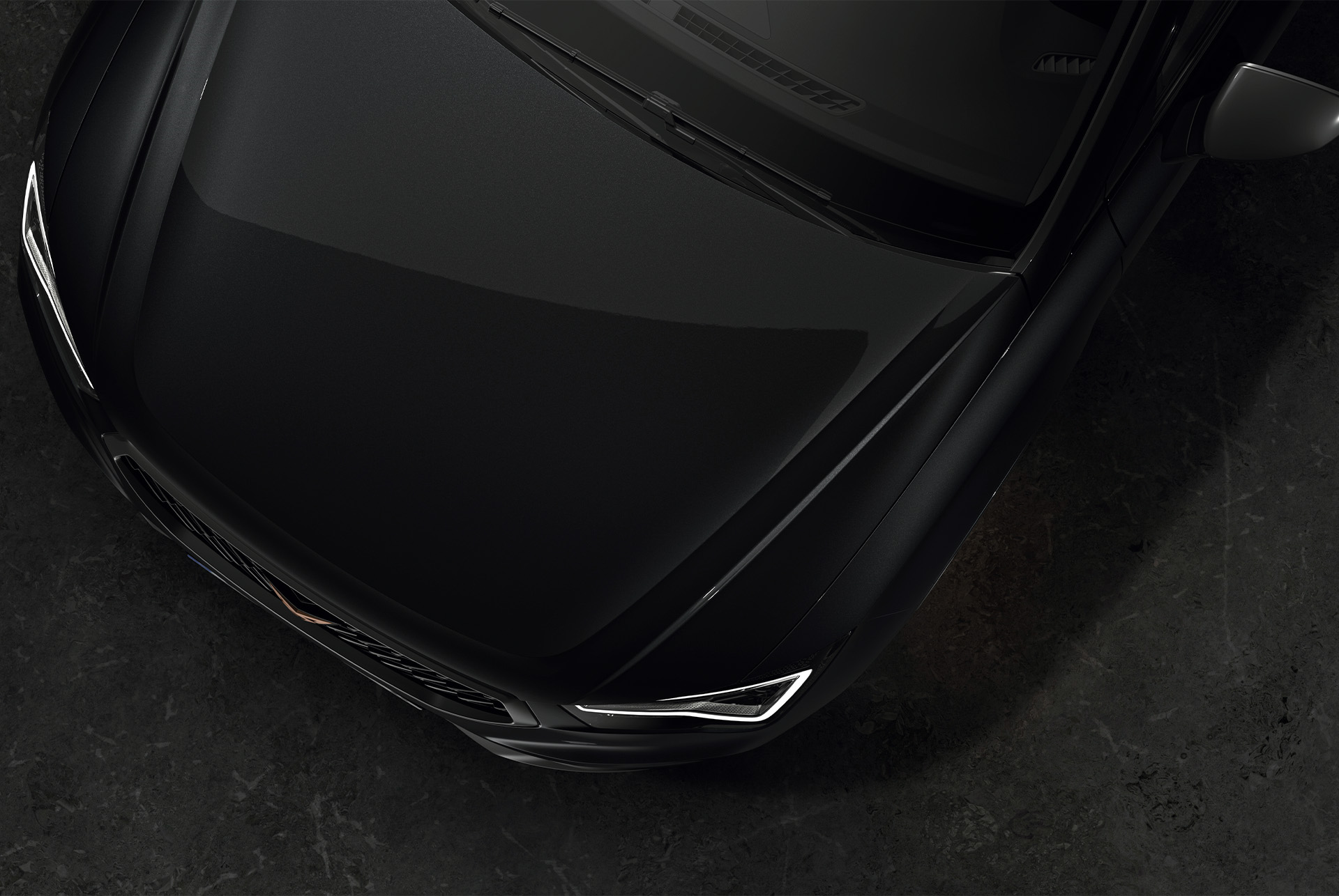 Vue de dessus de la CUPRA Ateca en Noir Magique mettant en avant la couleur audacieuse et élégante du véhicule. 