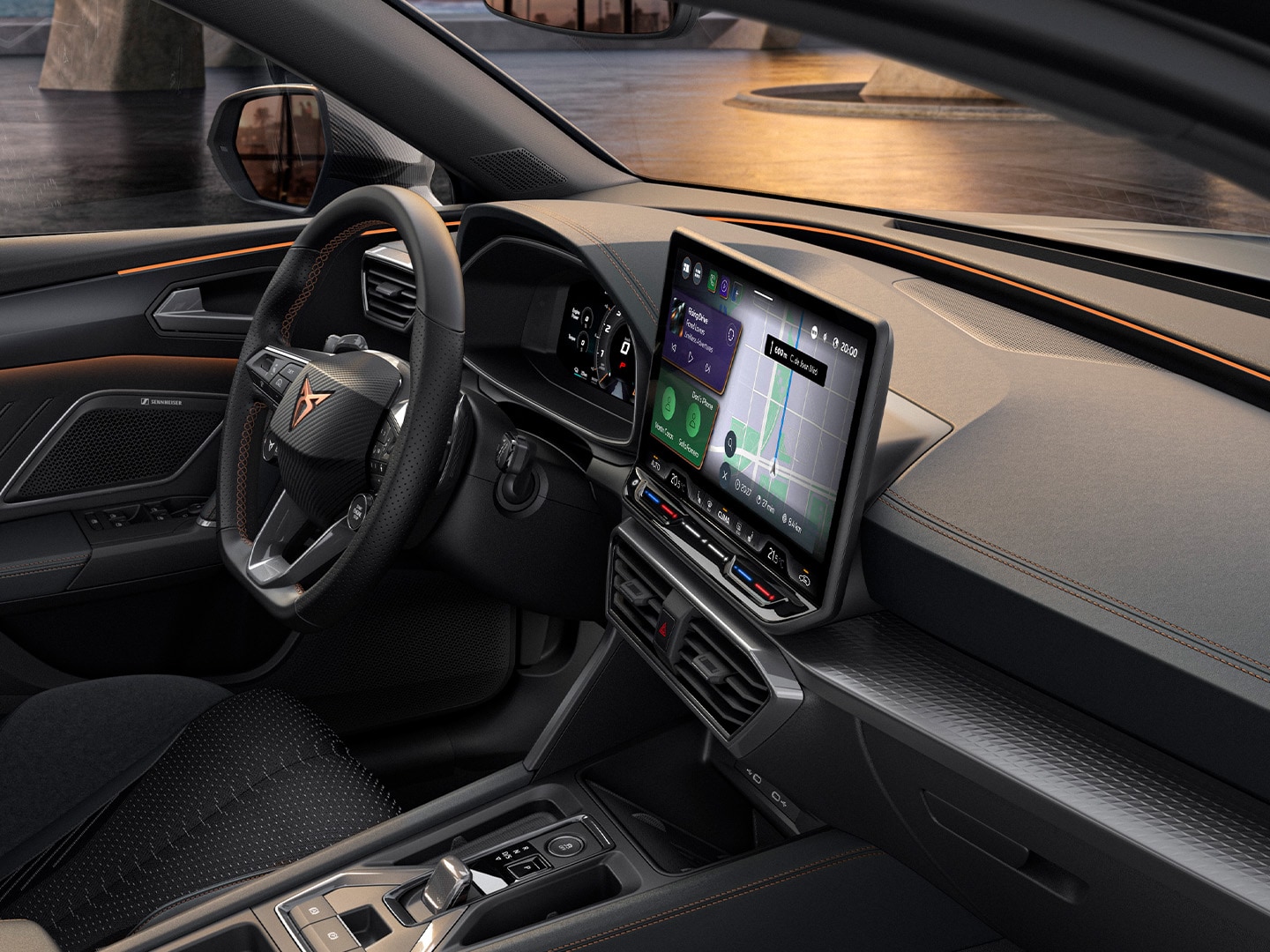Intérieur de la CUPRA Leon SP au design orienté conducteur associant un volant avec boutons mécaniques à un écran tactile pour renforcer l’expérience de conduite.