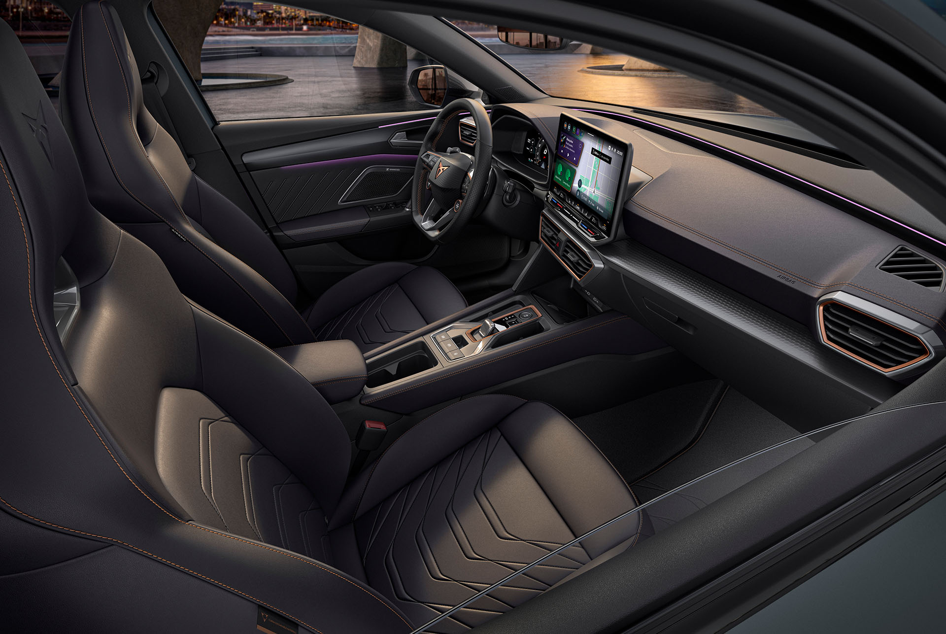 Vue intérieure de la nouvelle CUPRA Leon Sportstourer 2024 Bleu Fjord avec sièges baquets, système de navigation et système d'aération