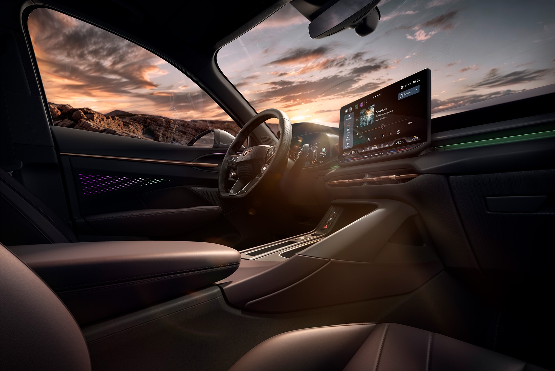 intérieur du nouveau CUPRA Terramar 2025 high canyon comprenant un système d’infotainment de 12,9 pouces, un tableau de bord, un volant avec palettes de changement de vitesse, des touches et une fonction de chauffage.