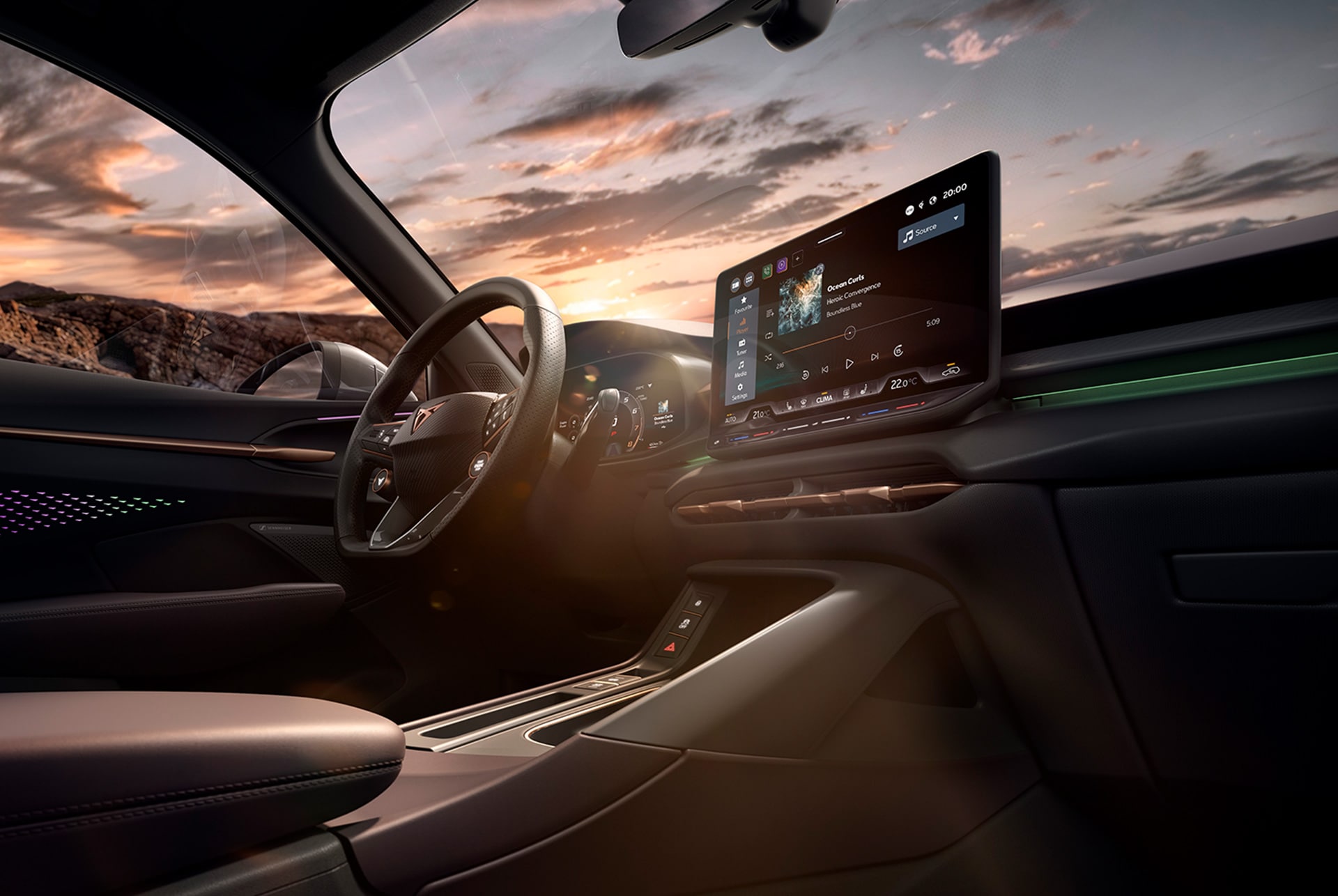 intérieur du nouveau cupra terramar avec système d’infotainment, palettes de changement de vitesse sur le volant et tableau de bord aux accents cuivrés.