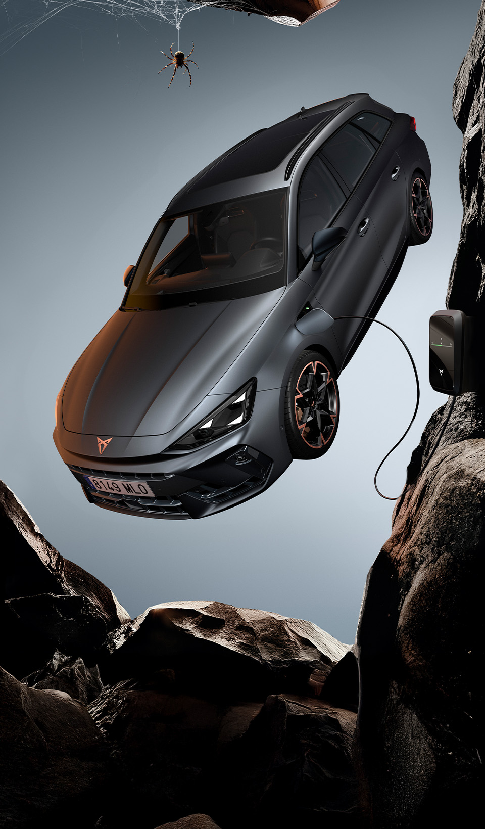A CUPRA Terramar SUV shown from a high angle, appearing to be in motion with a red light streak extending from its side to a person lying horizontally in the air next to it.